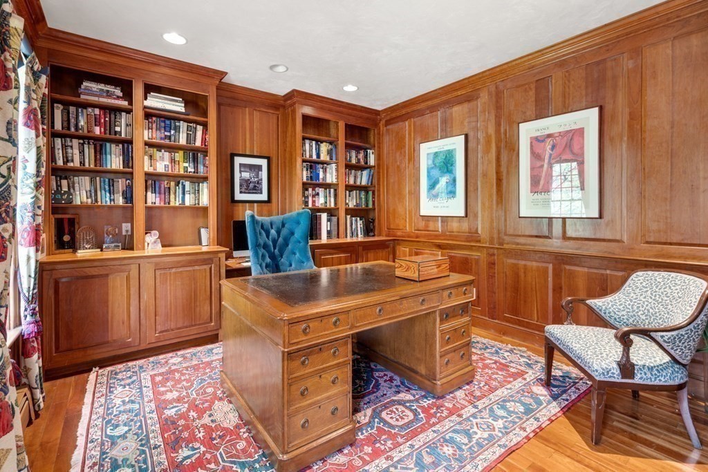 47 Claypit Hill Road Wayland, MA 01778 - Photo 5 of 21 a living room with furniture and a bookshelf