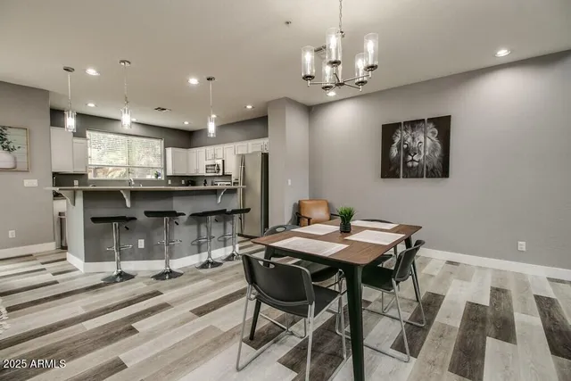 a view of a dining room with furniture