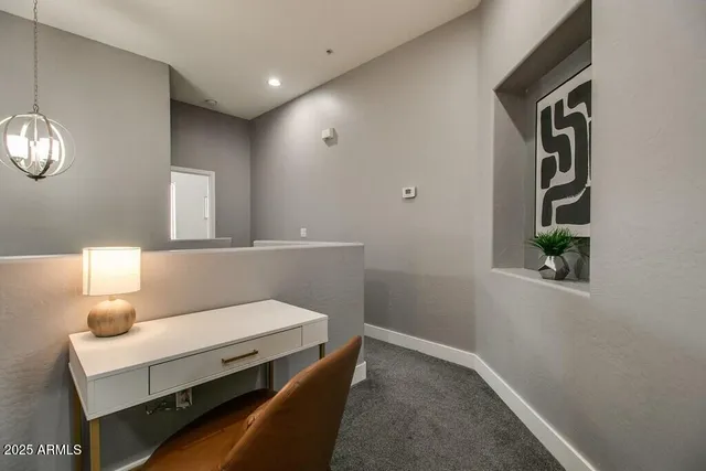 a view of a livingroom with furniture