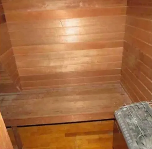 a view of a swimming pool with a yard