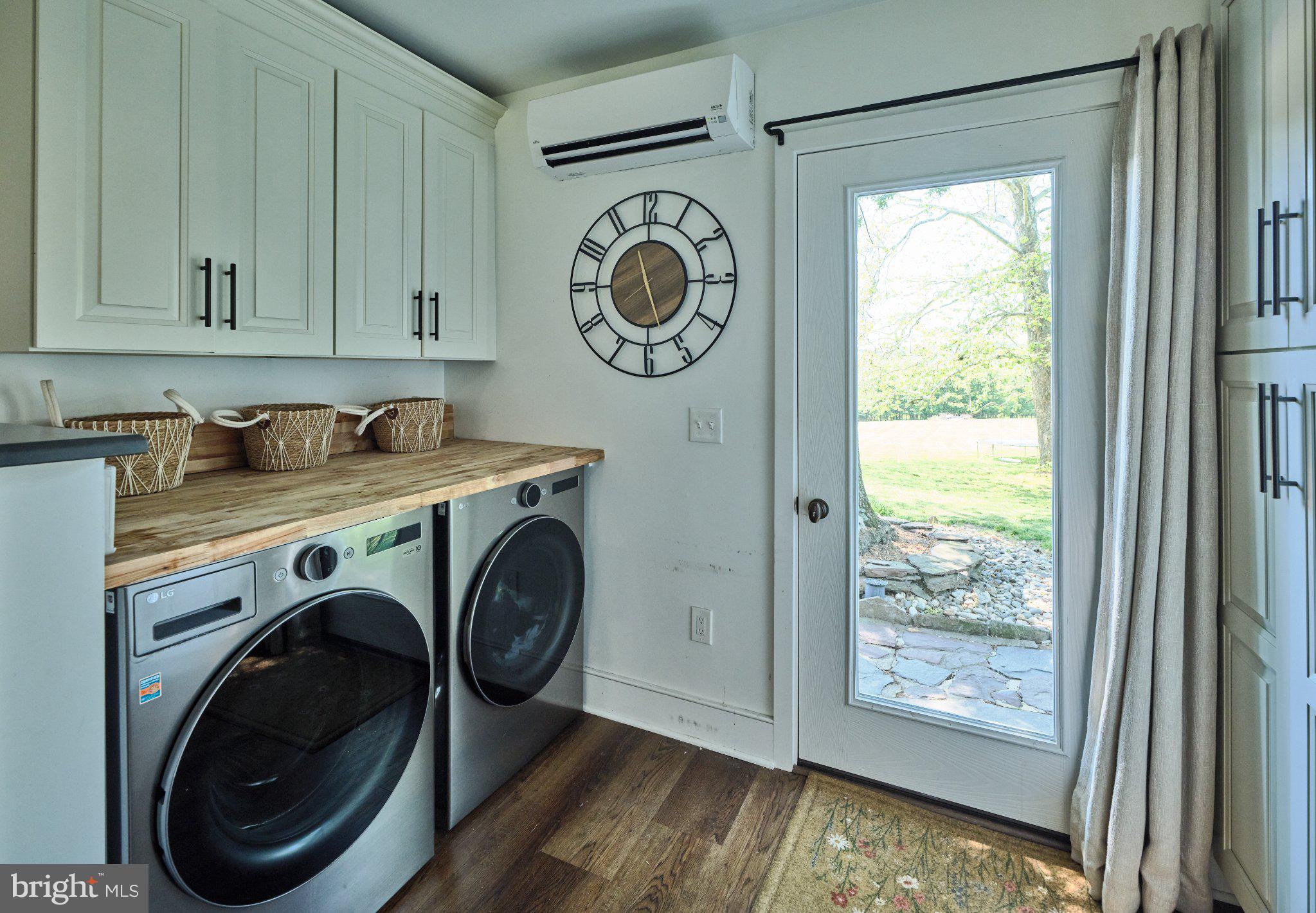 765 Swamp Road Newtown, PA 18940 - Photo 14 of 37 a utility room with dryer and washer