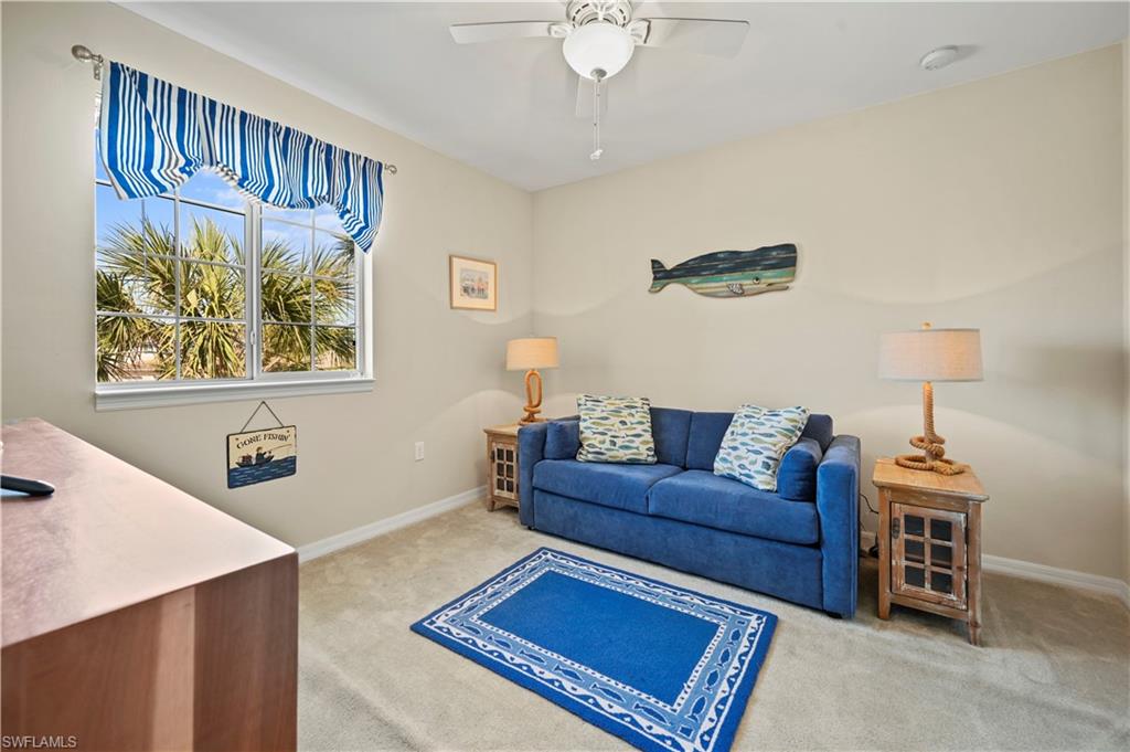 3922 Cherrybrook Loop Fort Myers, FL 33966 - Photo 13 of 38 a living room with furniture and a rug