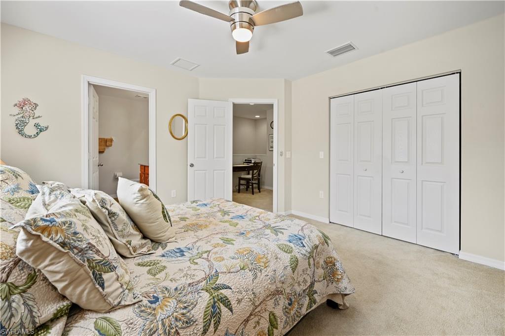 3922 Cherrybrook Loop Fort Myers, FL 33966 - Photo 17 of 38 a bedroom with a bed and a window
