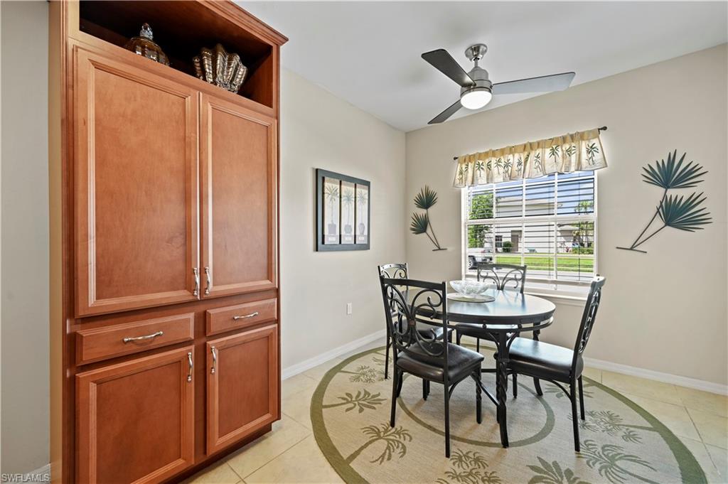 3922 Cherrybrook Loop Fort Myers, FL 33966 - Photo 19 of 38 a view of a dining room with furniture and a window