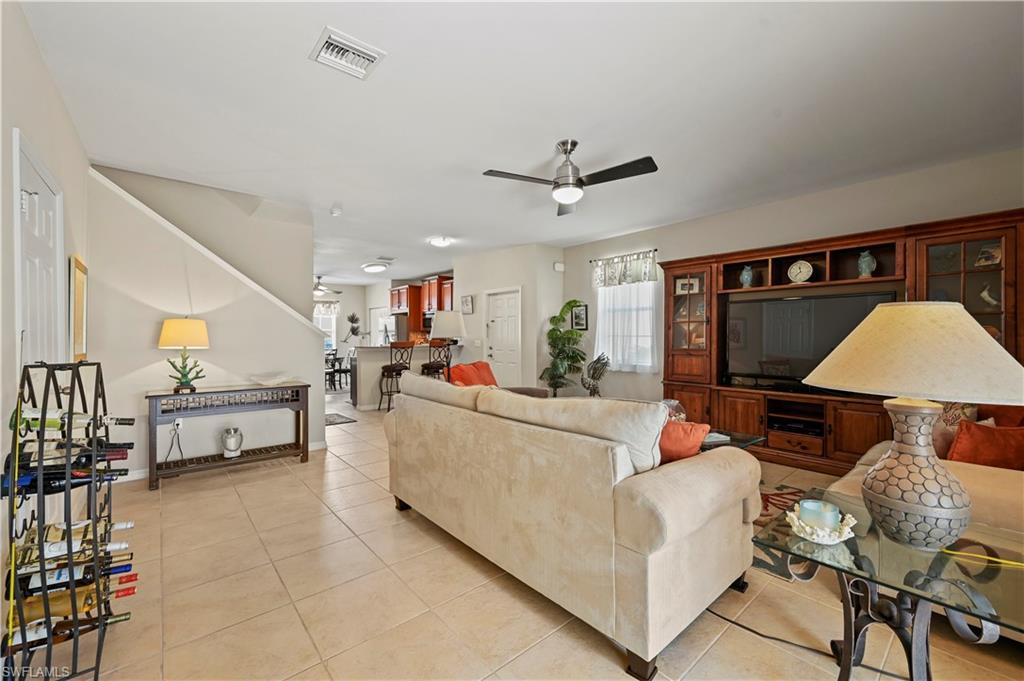 3922 Cherrybrook Loop Fort Myers, FL 33966 - Photo 21 of 38 a living room with furniture and a window