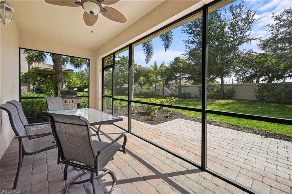 3922 Cherrybrook Loop Fort Myers, FL 33966 - Photo 22 of 38 a view of a porch with chairs and backyard