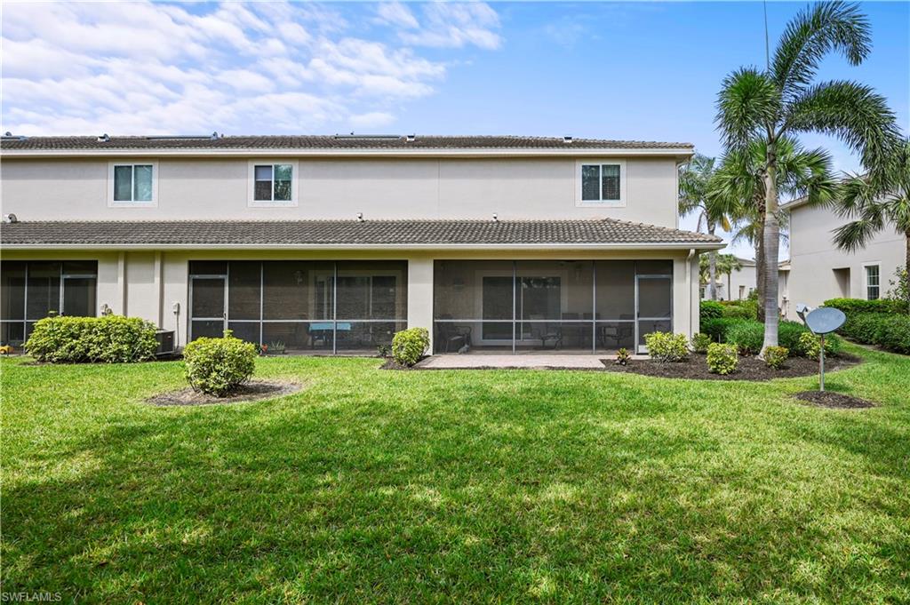 3922 Cherrybrook Loop Fort Myers, FL 33966 - Photo 24 of 38 a front view of a house with yard and porch