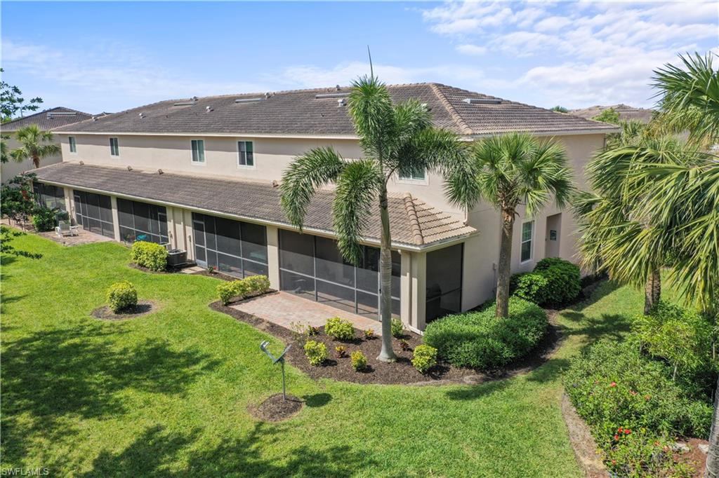 3922 Cherrybrook Loop Fort Myers, FL 33966 - Photo 25 of 38 a view of a house with a yard and potted plants