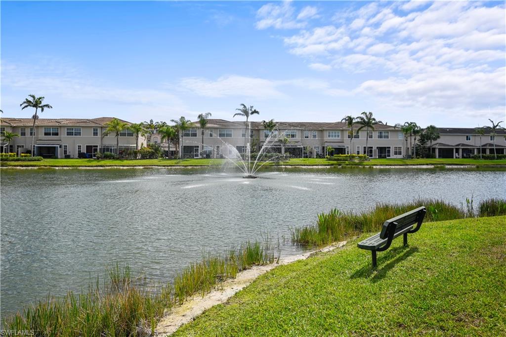 3922 Cherrybrook Loop Fort Myers, FL 33966 - Photo 28 of 38 a view of a lake with houses in the back