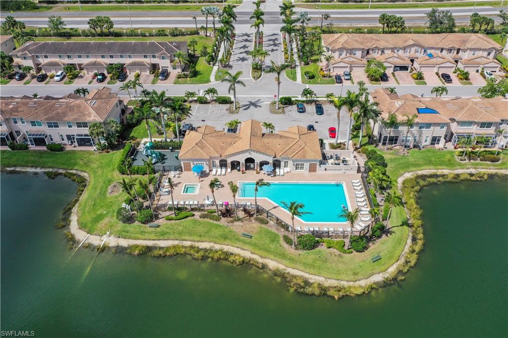 3922 Cherrybrook Loop Fort Myers, FL 33966 - Photo 29 of 38 an aerial view of a house with swimming pool and outdoor seating
