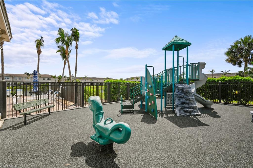 3922 Cherrybrook Loop Fort Myers, FL 33966 - Photo 37 of 38 a view of a terrace with furniture and a garden