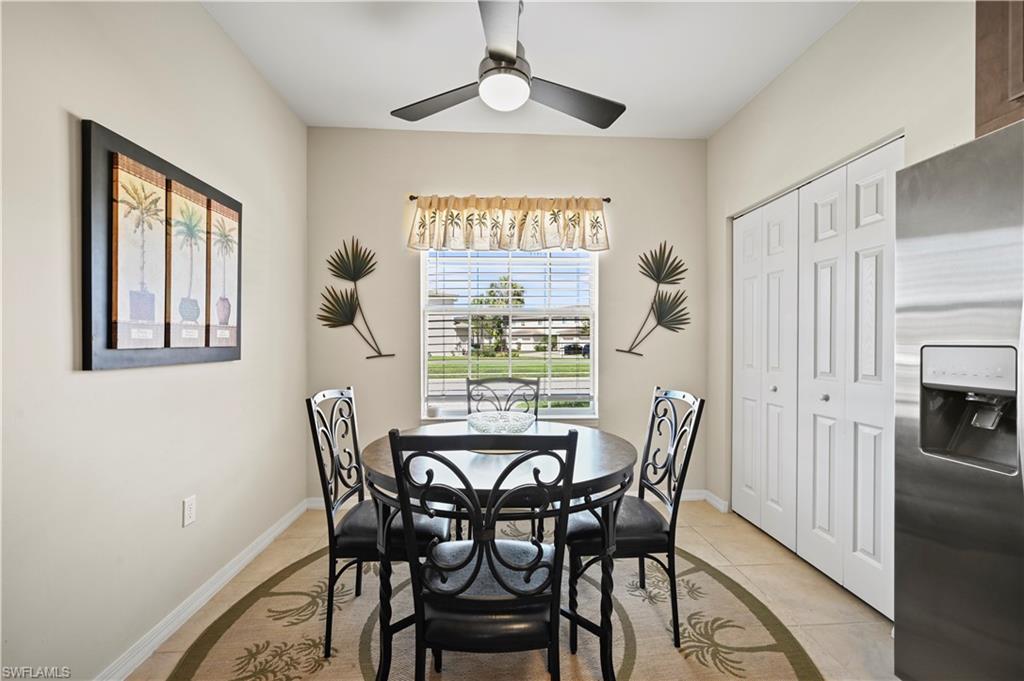 3922 Cherrybrook Loop Fort Myers, FL 33966 - Photo 7 of 38 a view of a dining room with furniture window and outside view