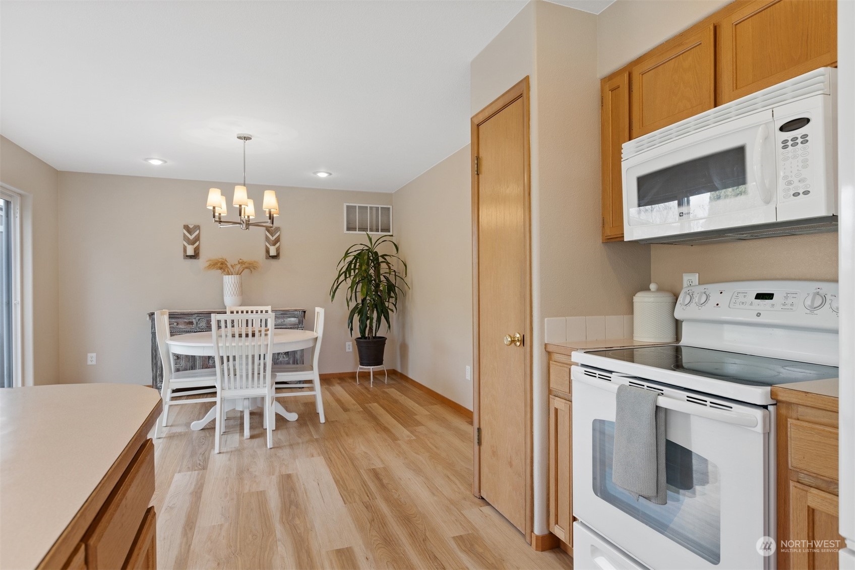 1308 Roma Road Bellingham, WA 98226 - Photo 11 of 39 a view of a dining room with furniture and wooden floor