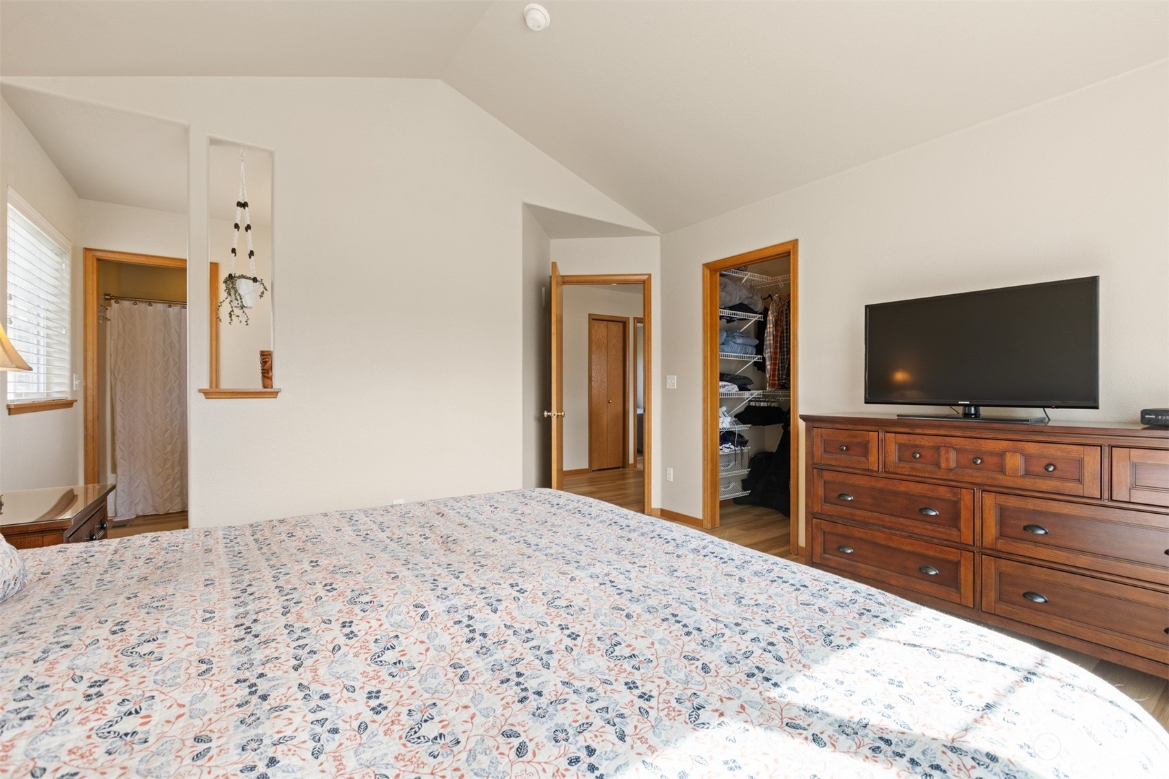 1308 Roma Road Bellingham, WA 98226 - Photo 17 of 39 a bedroom with a bed and a flat screen tv