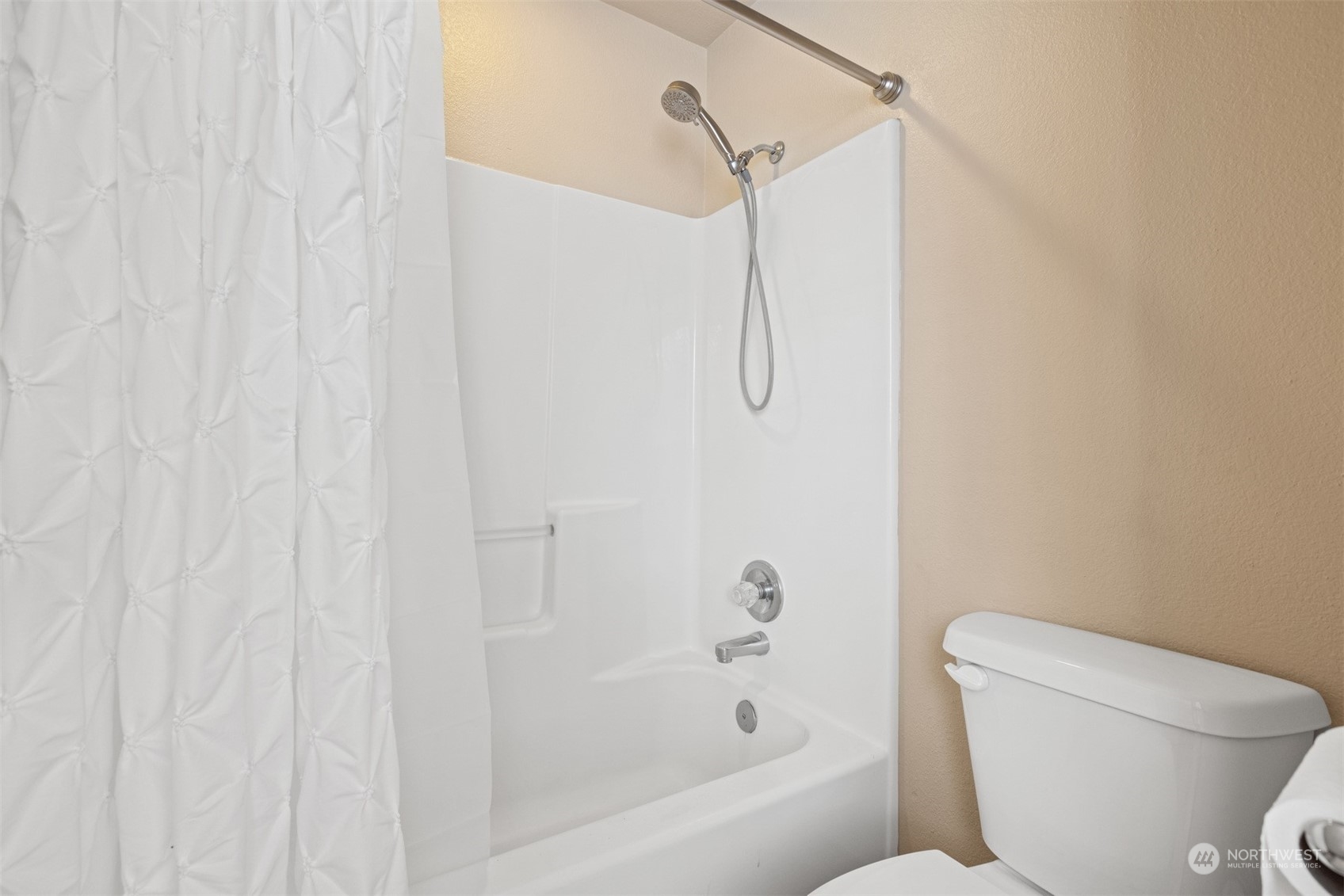 1308 Roma Road Bellingham, WA 98226 - Photo 20 of 39 a bathroom with a shower curtain and toilet