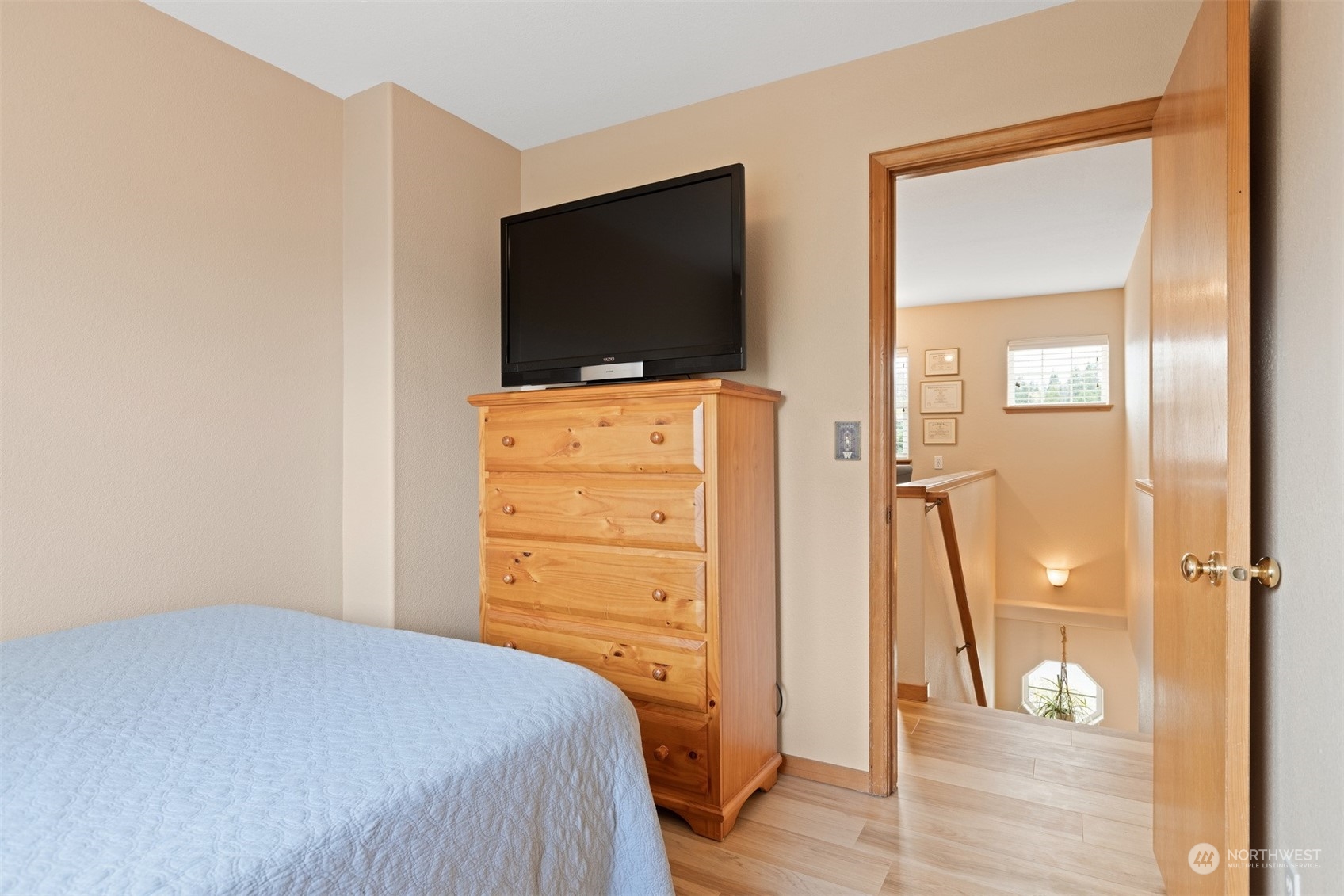 1308 Roma Road Bellingham, WA 98226 - Photo 22 of 39 a bedroom with a bed and a flat screen tv