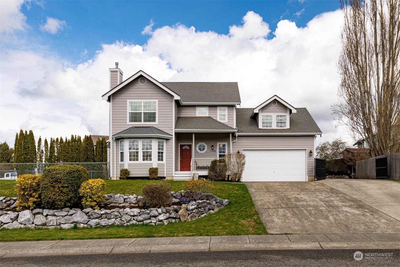 1308 Roma Road Bellingham, WA 98226 - Photo 31 of 39 a front view of a house with garden
