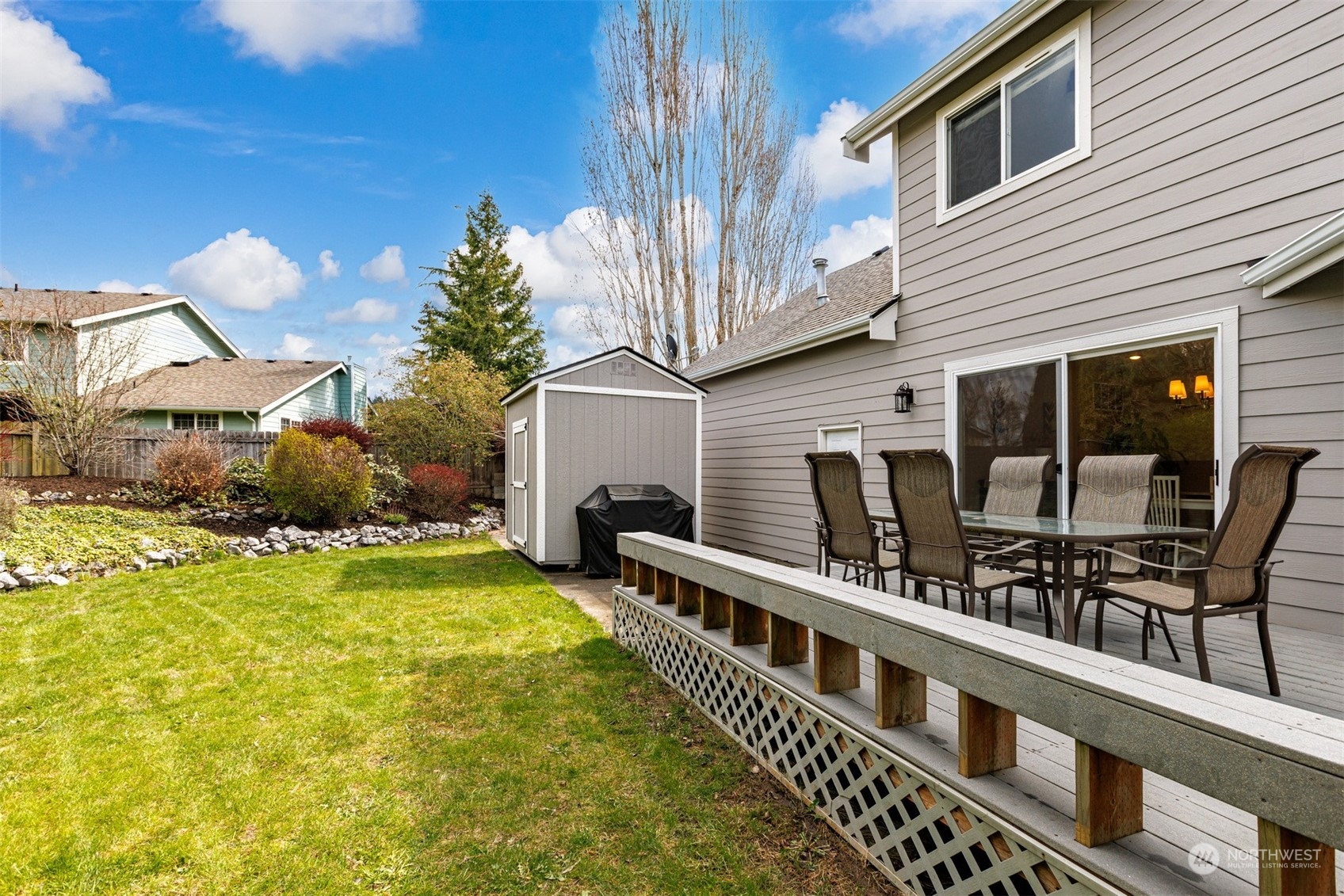 1308 Roma Road Bellingham, WA 98226 - Photo 35 of 39 a view of a house with pool and chairs