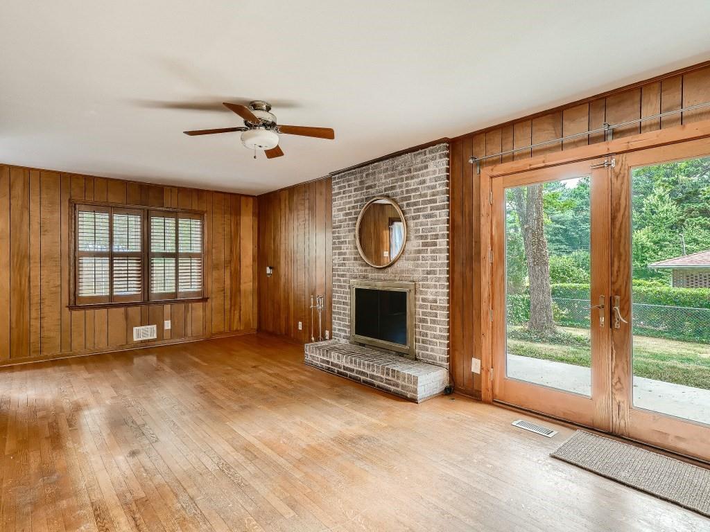 3786 Evans Road Atlanta, GA 30340 - Photo 1 of 1 Family room with entrance to backyard, Side yard and garage