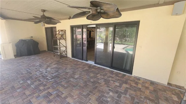 a view of a hallway to a bedroom