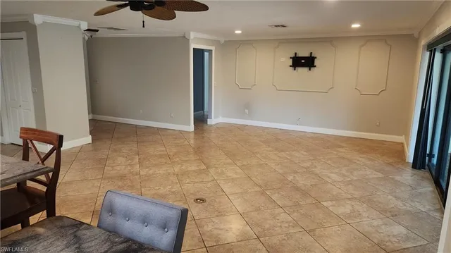 a view of a hallway with seating area