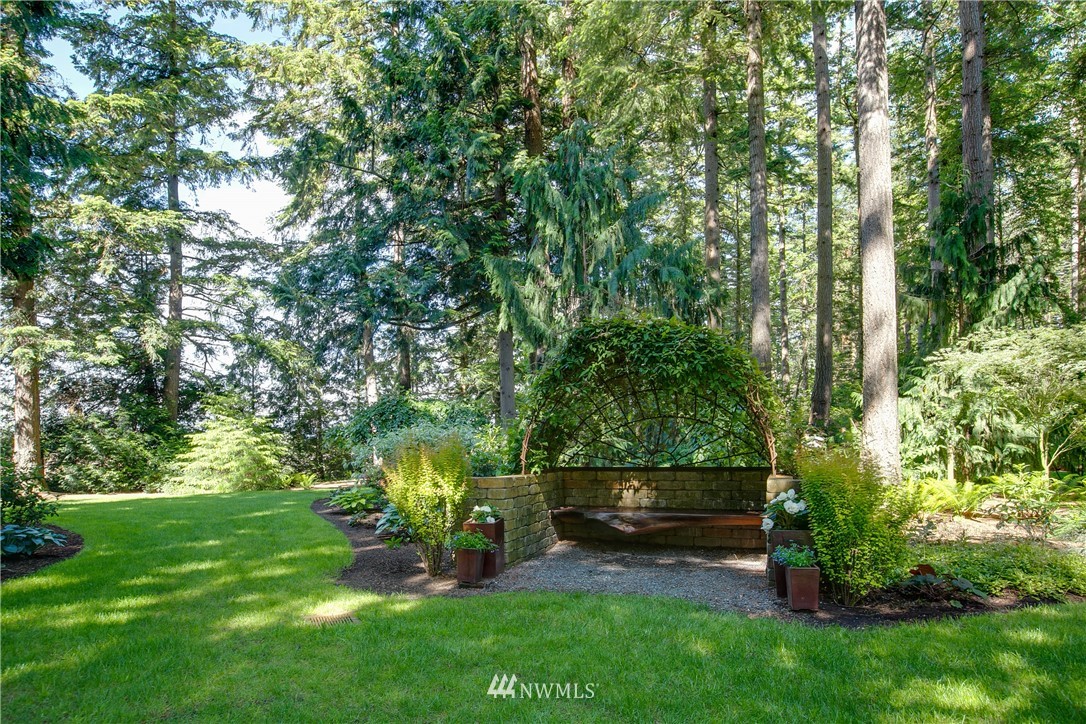 698 West Pole Road Ferndale, WA 98248 - Photo 15 of 40 a view of a bench in a garden