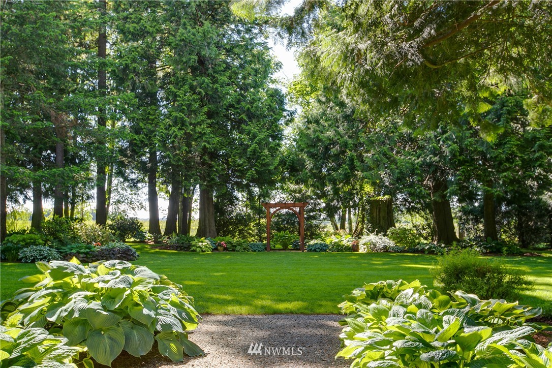 698 West Pole Road Ferndale, WA 98248 - Photo 16 of 40 a garden view with a sitting space