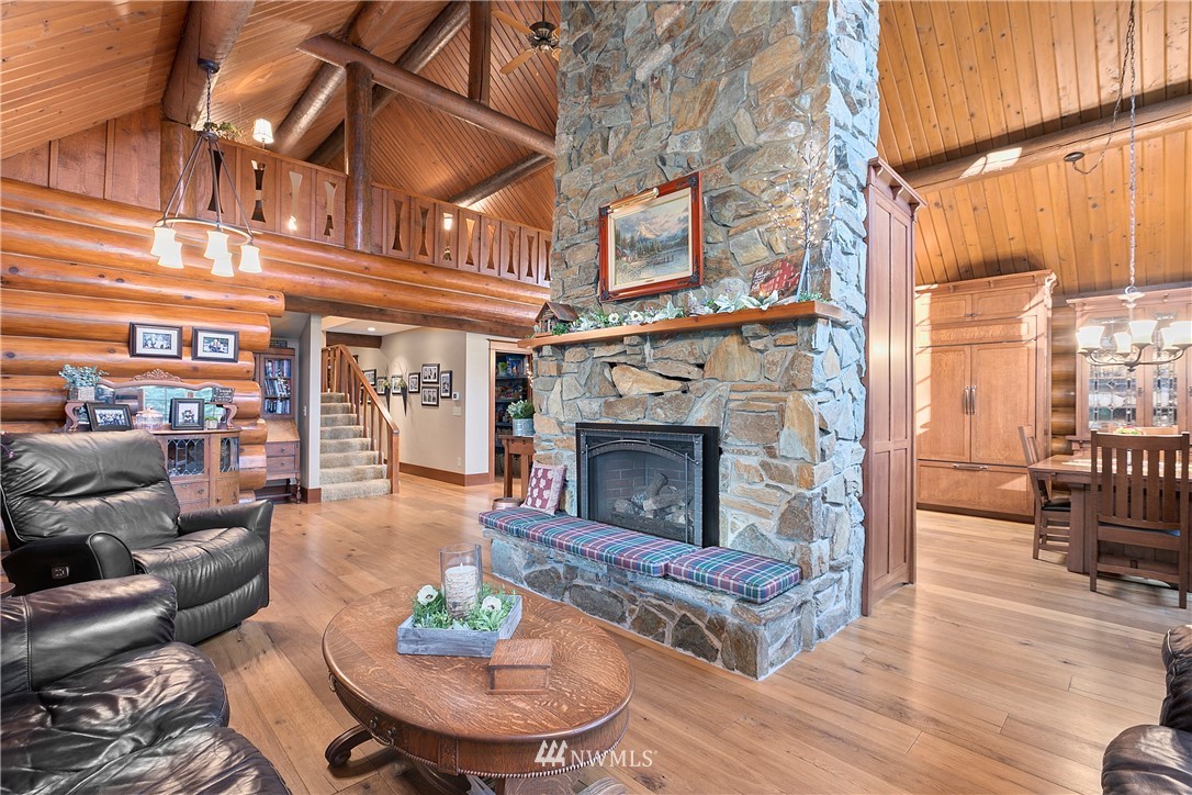 698 West Pole Road Ferndale, WA 98248 - Photo 20 of 40 a living room with furniture and a fireplace