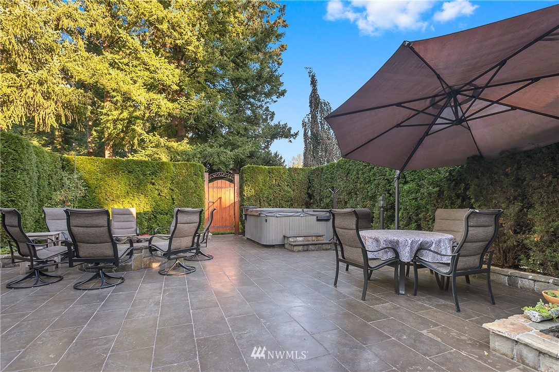 698 West Pole Road Ferndale, WA 98248 - Photo 3 of 40 a view of a chairs and table under an umbrella in backyard