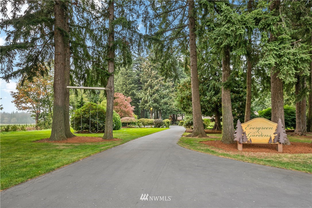698 West Pole Road Ferndale, WA 98248 - Photo 7 of 40 a view of a park with large trees