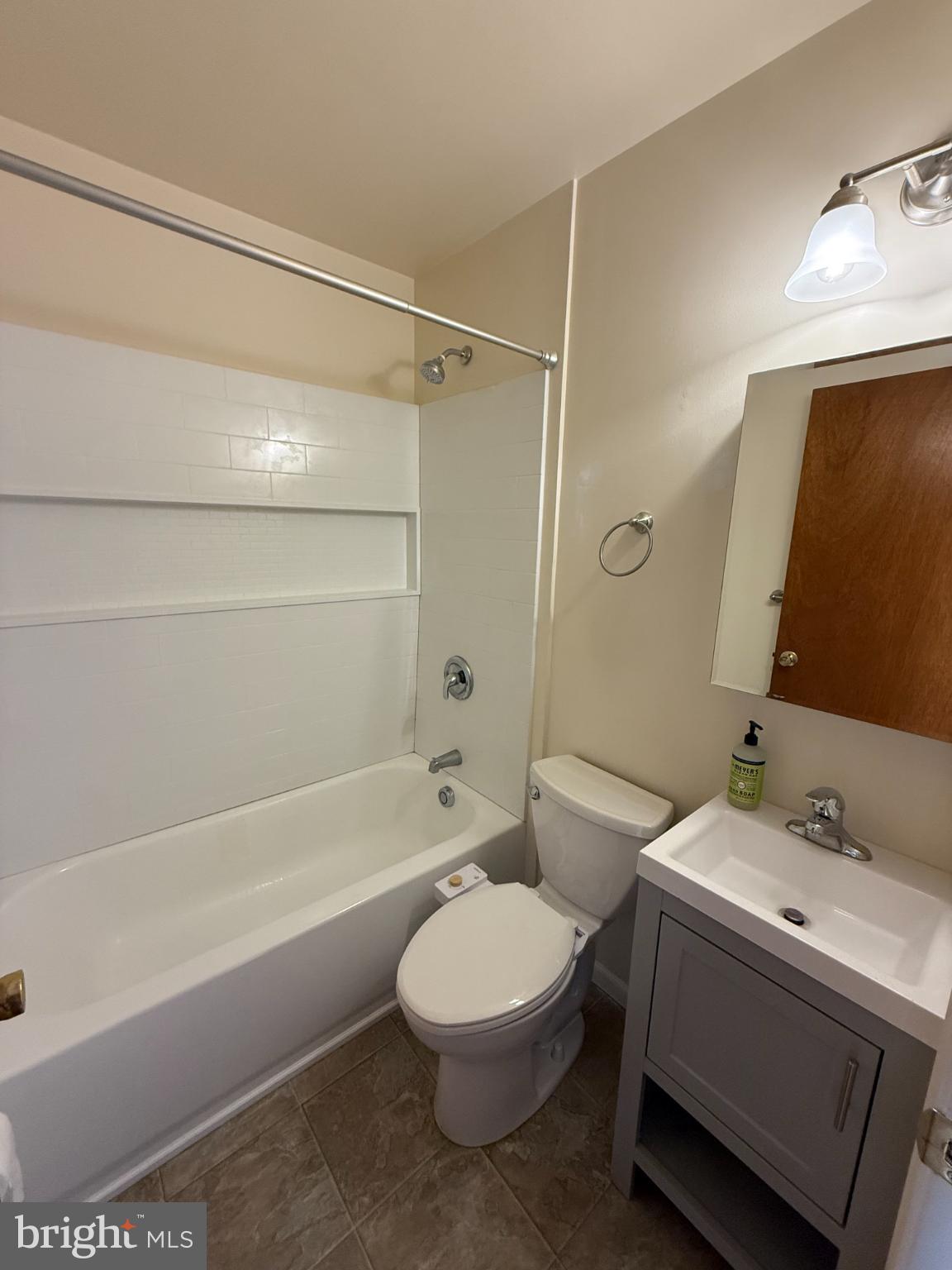 48 West West Street Baltimore, MD 21230 - Photo 2 of 10 a bathroom with a sink a toilet and a bathtub