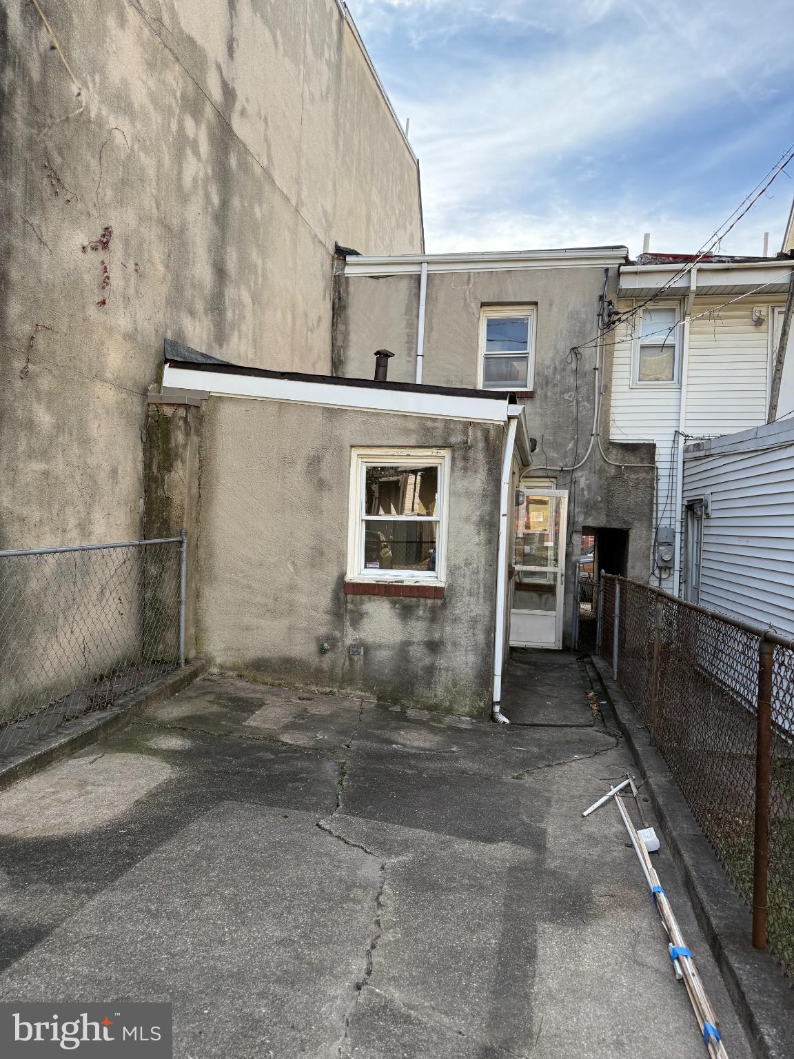 48 West West Street Baltimore, MD 21230 - Photo 10 of 10 a view of backyard with barbeque grill and wooden wall