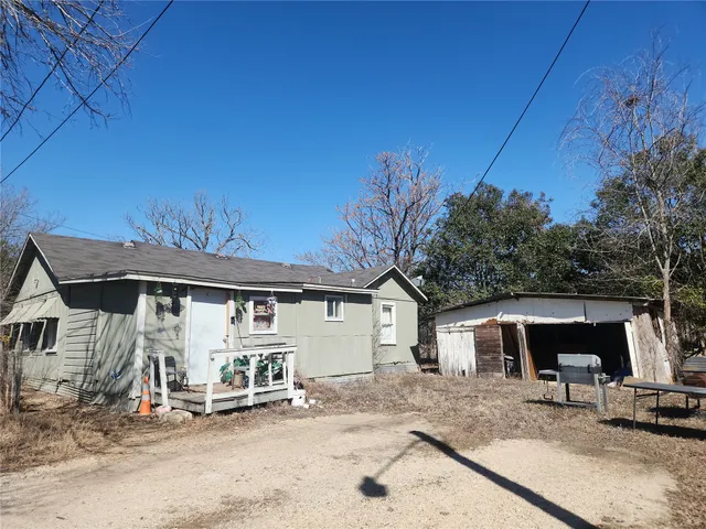 a front view of a house with a patio