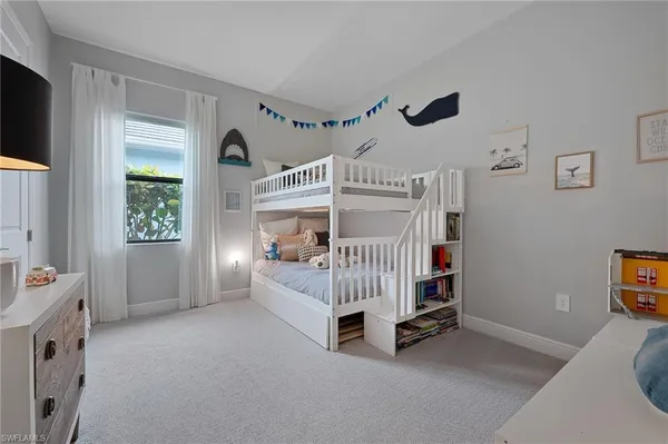 a bathroom with a double vanity sink toilet and shower