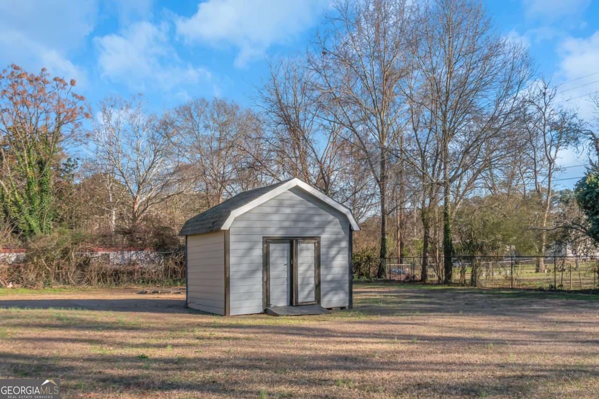24 David Drive Hampton, GA 30228 - Photo 3 of 21 a view of a house with a yard