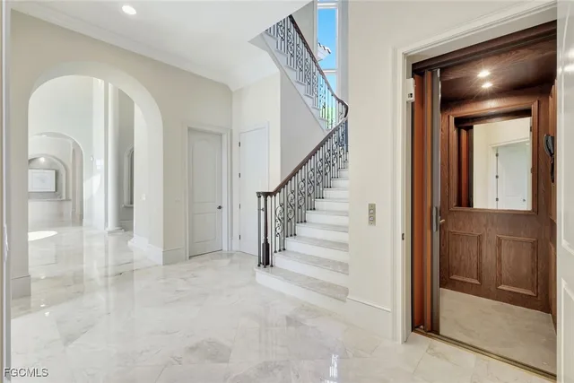 a kitchen with stainless steel appliances a sink stove and refrigerator