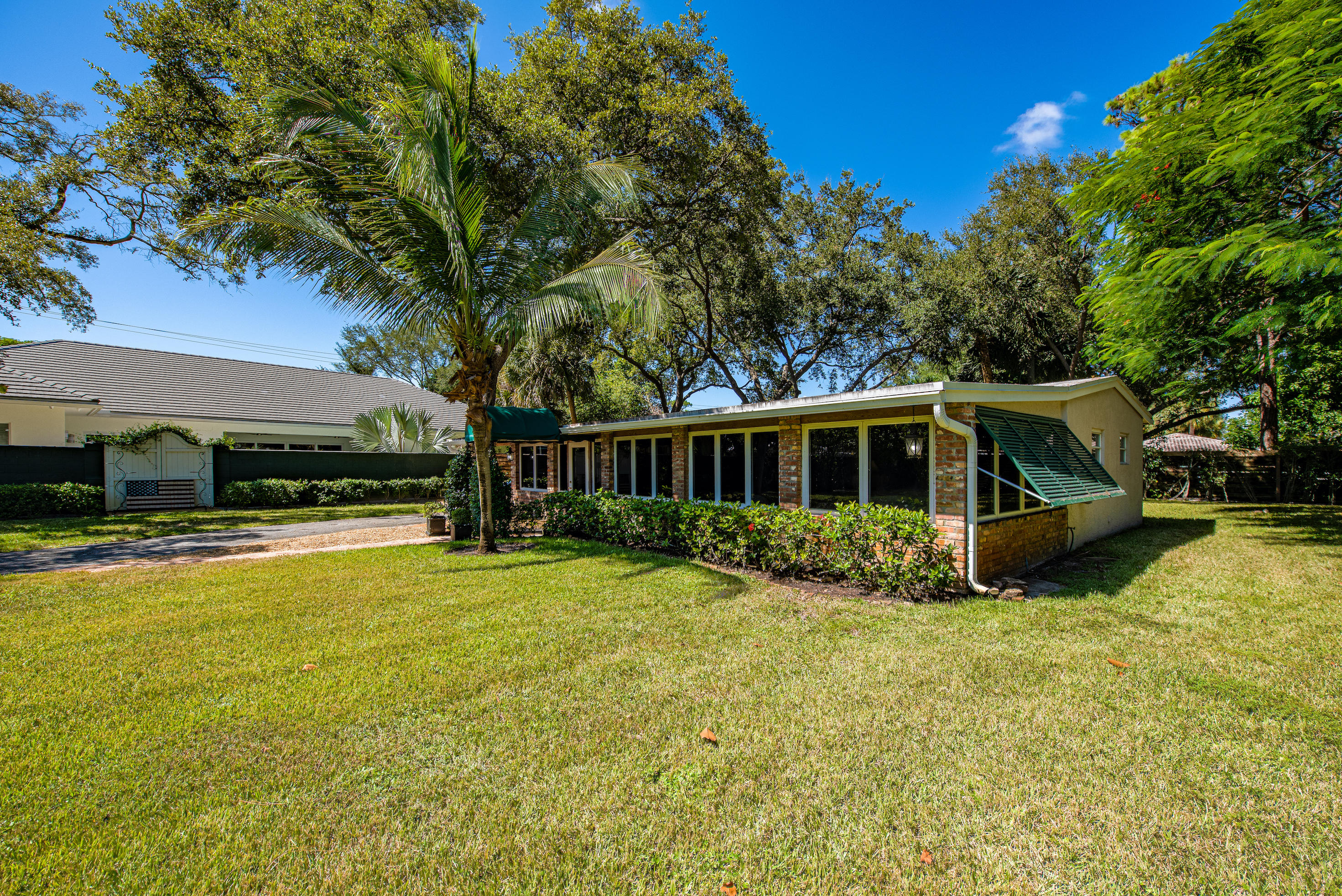 499 Northwest 9th Avenue Boca Raton, FL 33486 - Photo 13 of 20 Front-Of-House-And-Yard-2