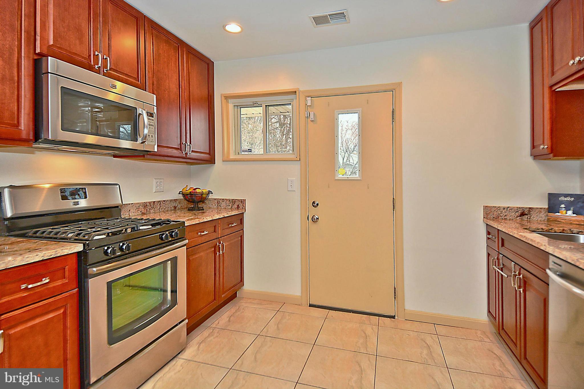 3915 Braddock Road Alexandria, VA 22312 - Photo 7 of 30 Kitchen Exits to Back Yard