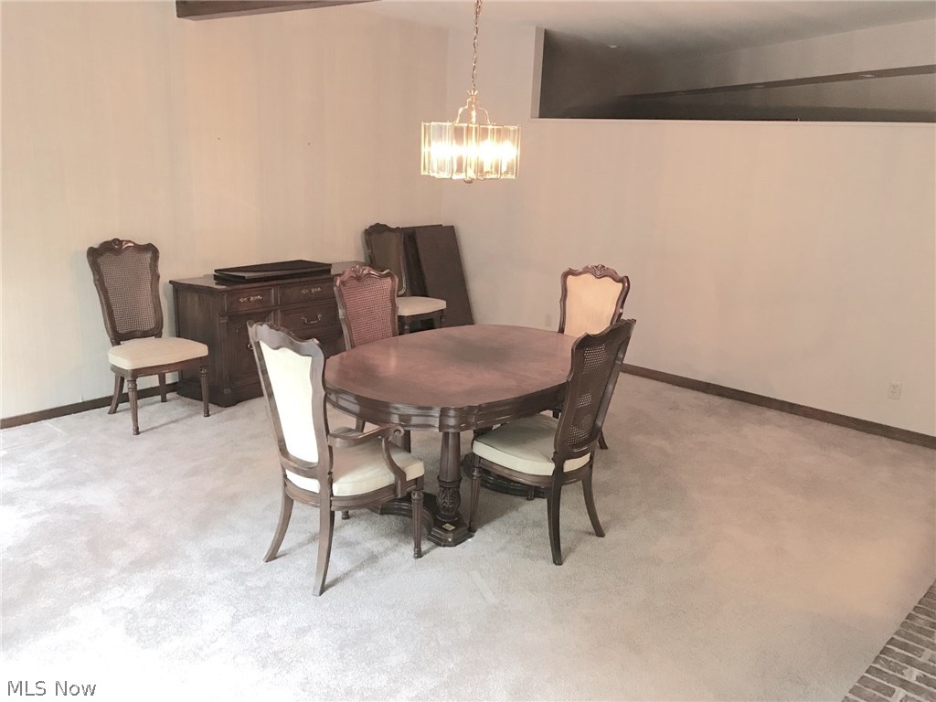 297 North Road Northeast Warren, OH 44483 - Photo 15 of 35 Dining room view with L-shaped office behind wall.