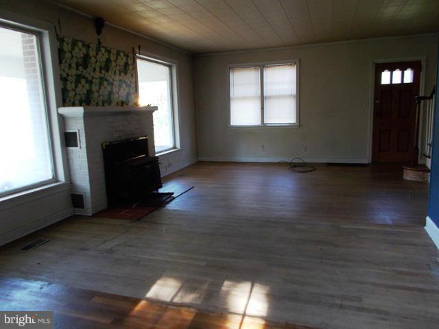 1117 Harkins Road Pylesville, MD 21132 - Photo 12 of 27 Living Room w/FP & Wood Flrs