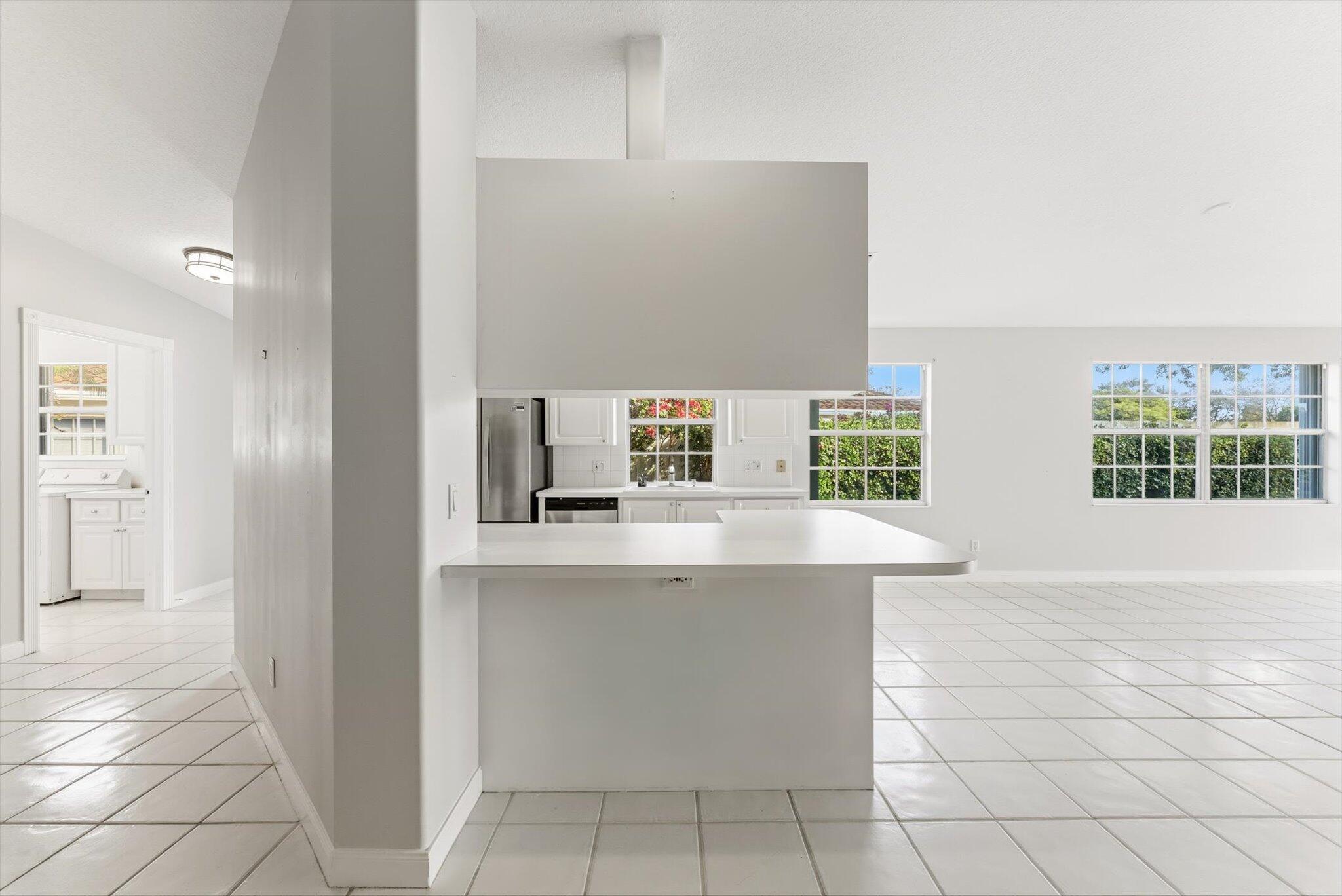 2162 Blue Springs Road West Palm Beach, FL 33411 - Photo 14 of 42 a view of kitchen with furniture and window