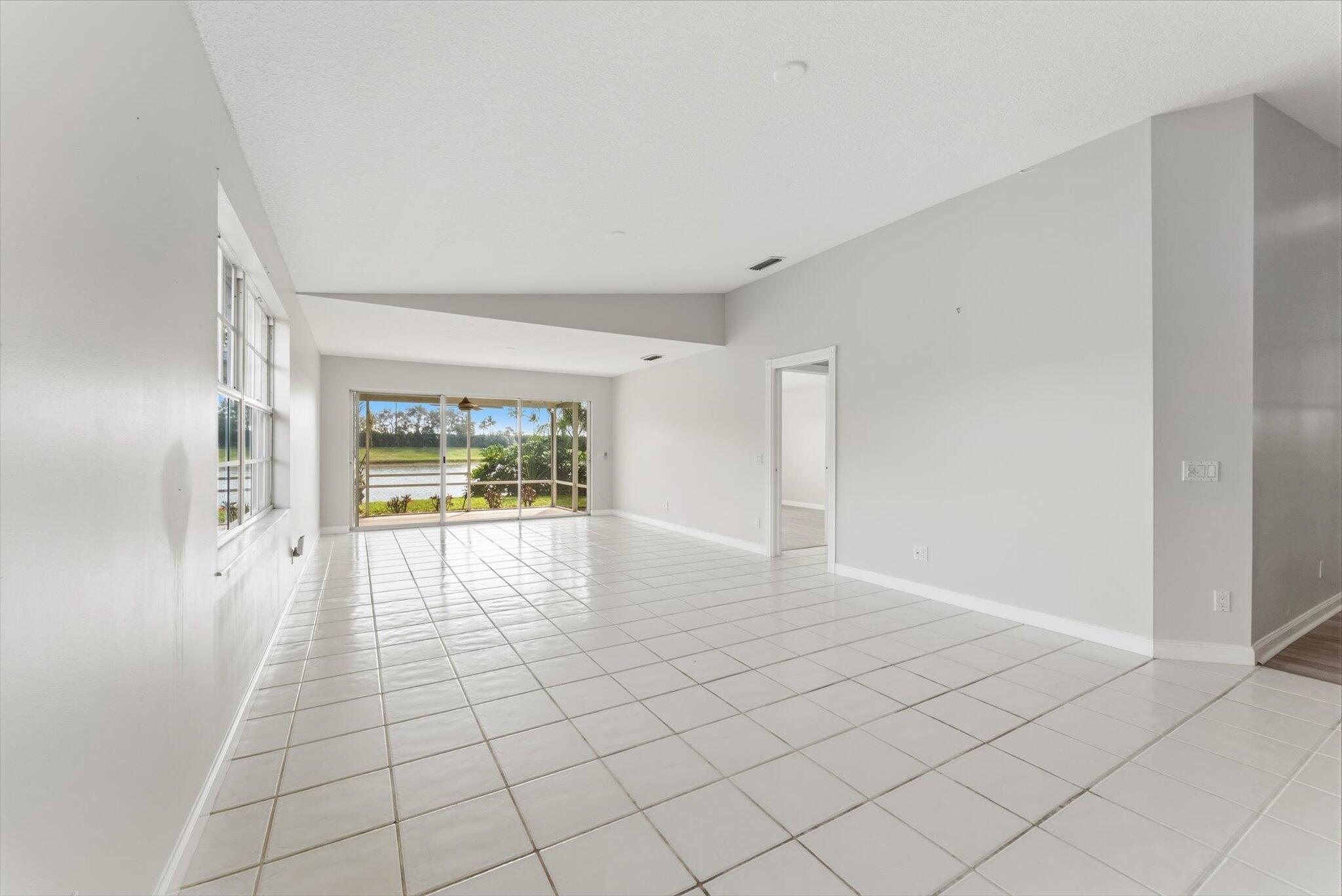2162 Blue Springs Road West Palm Beach, FL 33411 - Photo 15 of 42 a view of an empty room and window