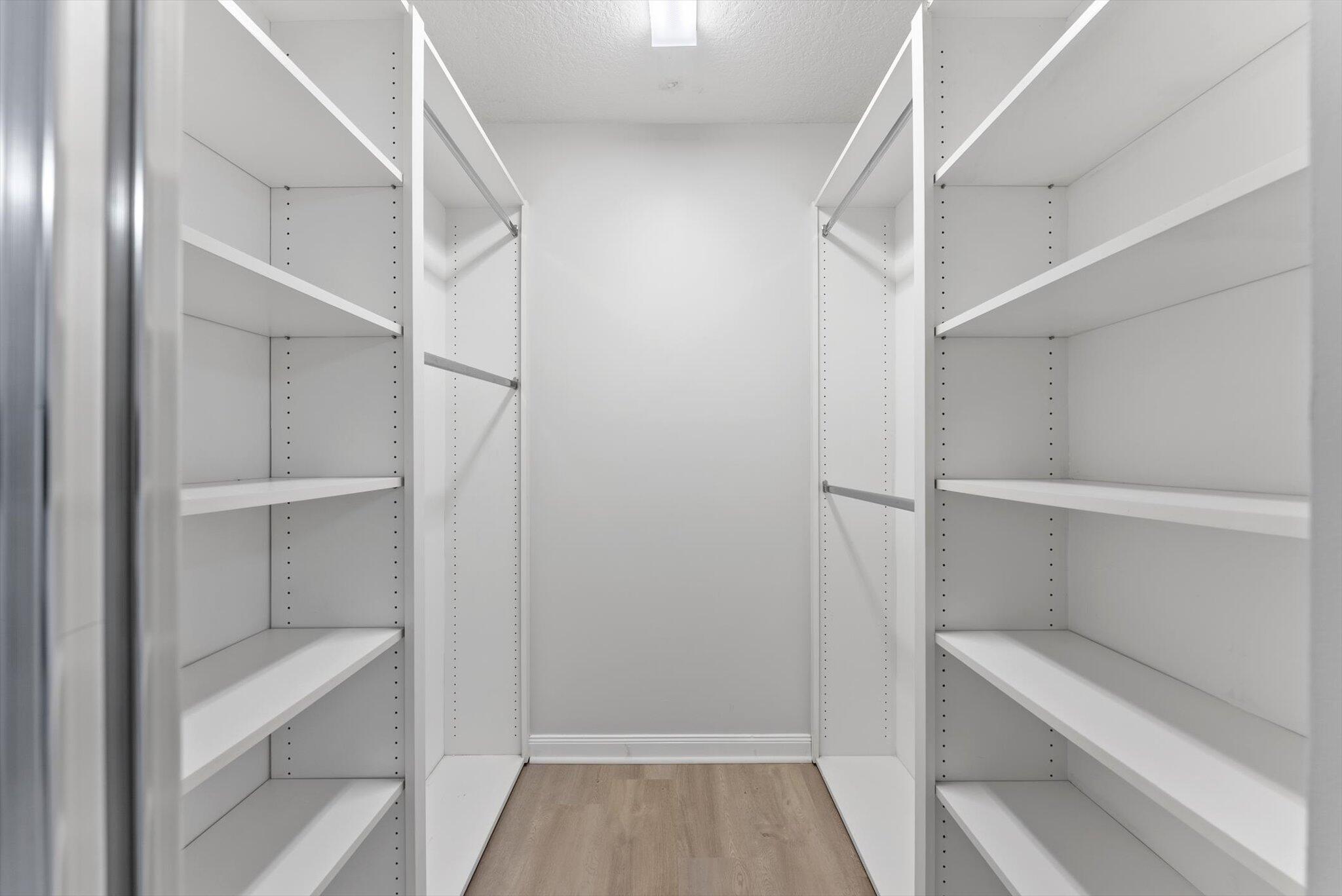 2162 Blue Springs Road West Palm Beach, FL 33411 - Photo 20 of 42 a view of walk in closet with empty racks