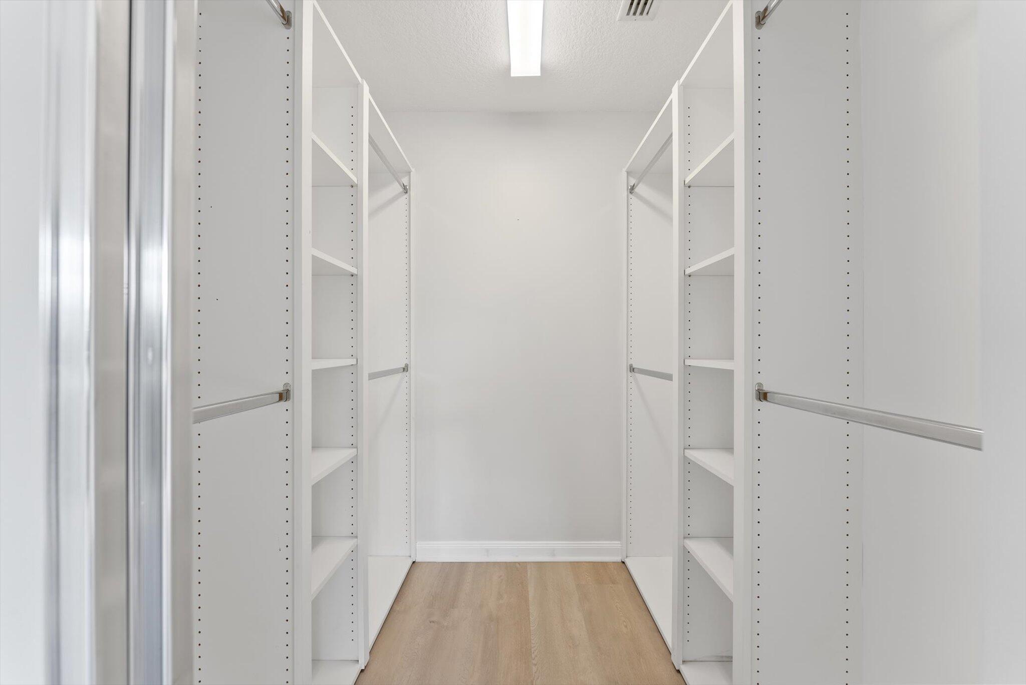 2162 Blue Springs Road West Palm Beach, FL 33411 - Photo 25 of 42 a view of a hallway with wooden floor and entryway