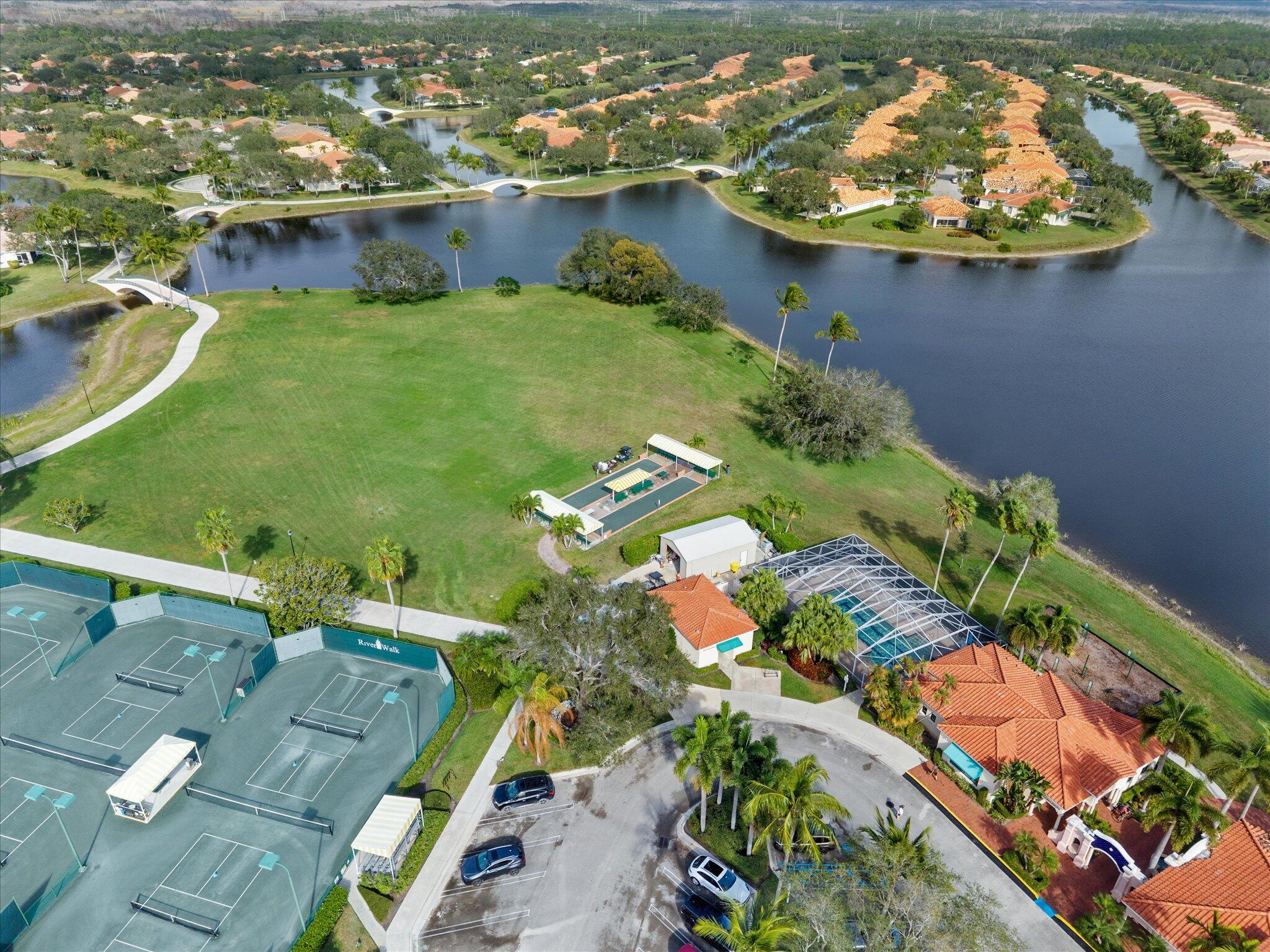 2162 Blue Springs Road West Palm Beach, FL 33411 - Photo 36 of 42 an aerial view of a house with a lake view