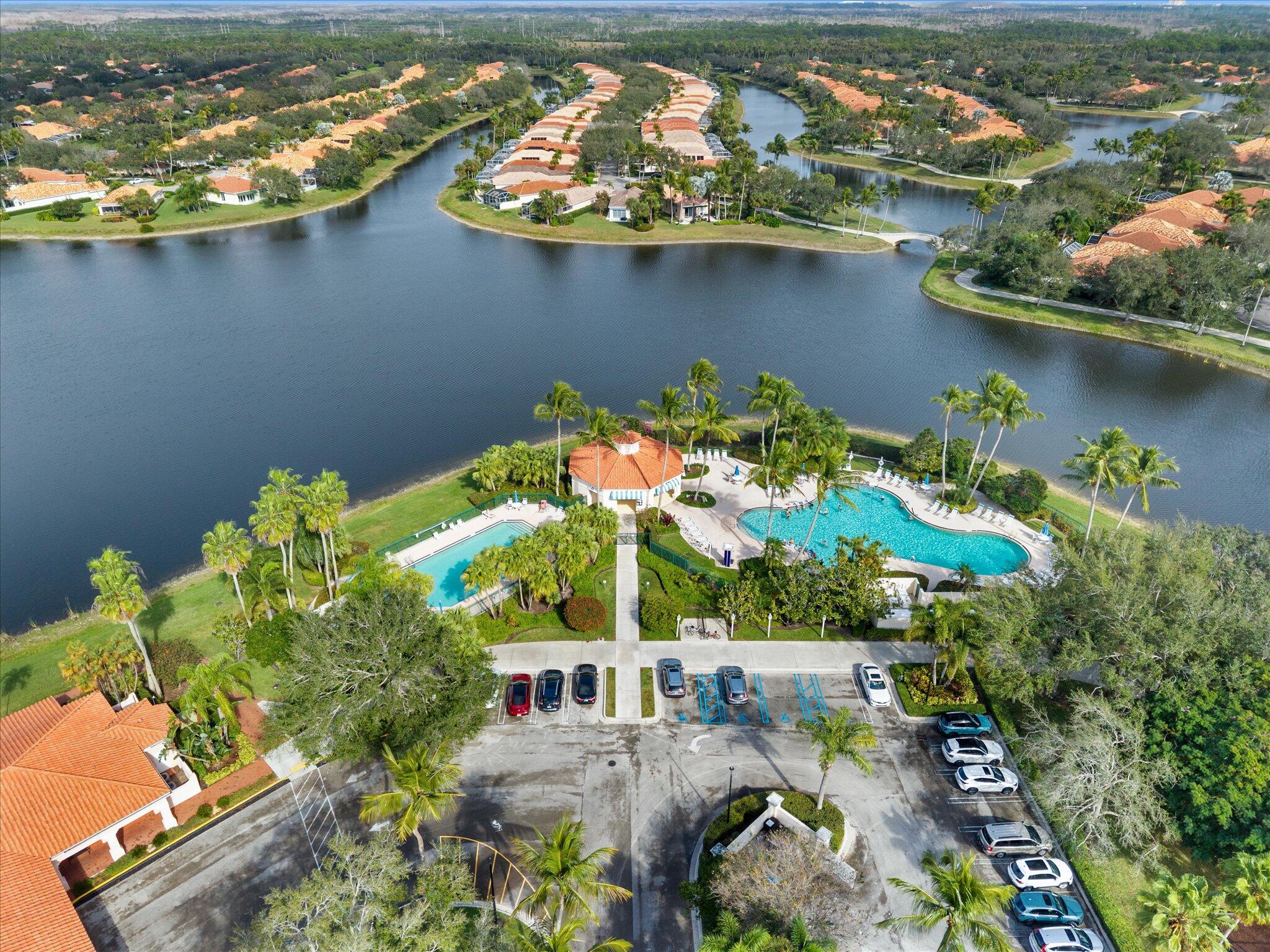 2162 Blue Springs Road West Palm Beach, FL 33411 - Photo 37 of 42 an aerial view of a house with a lake view