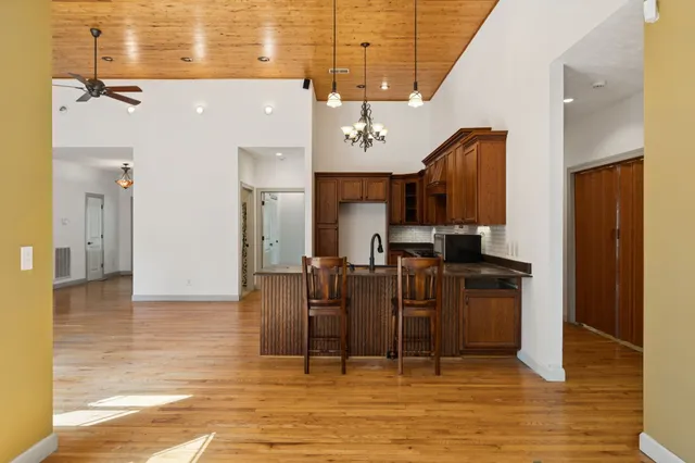 a view of a room with a large window