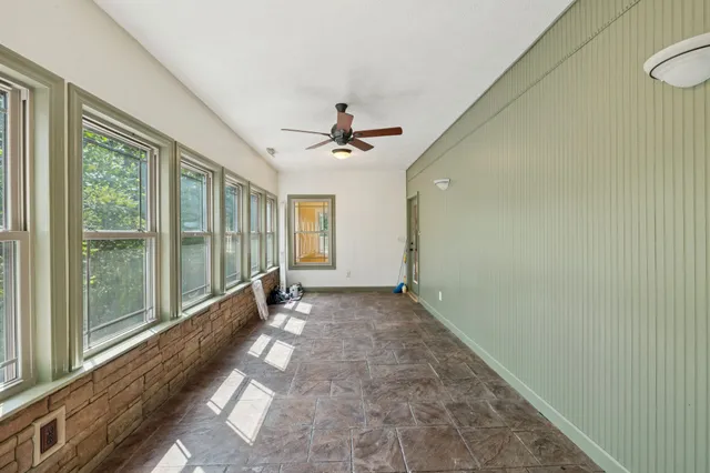 a bathroom with a toilet a sink and bathtub