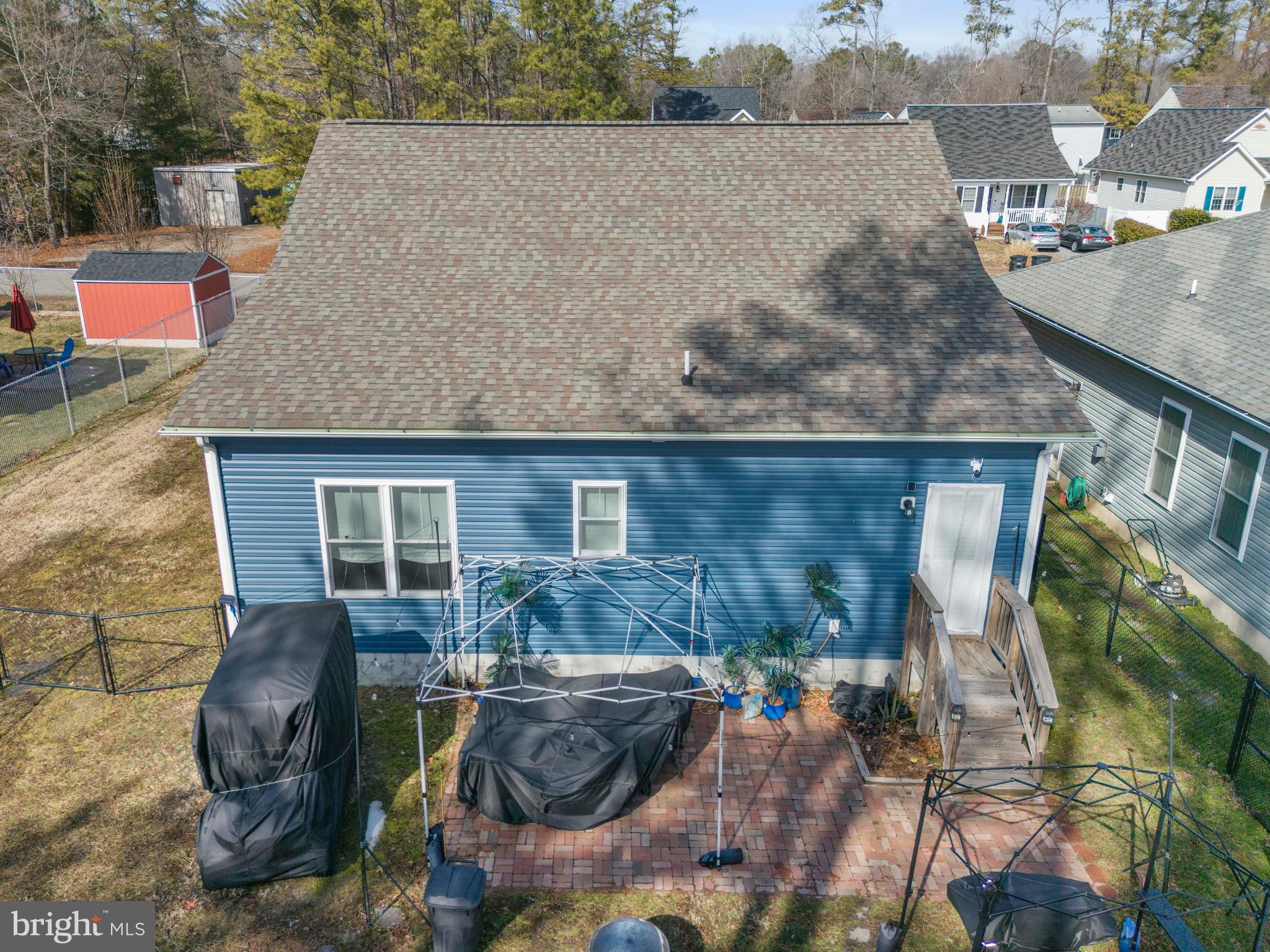 324 3rd Street Colonial Beach, VA 22443 - Photo 32 of 37 a backyard of a house with seating space