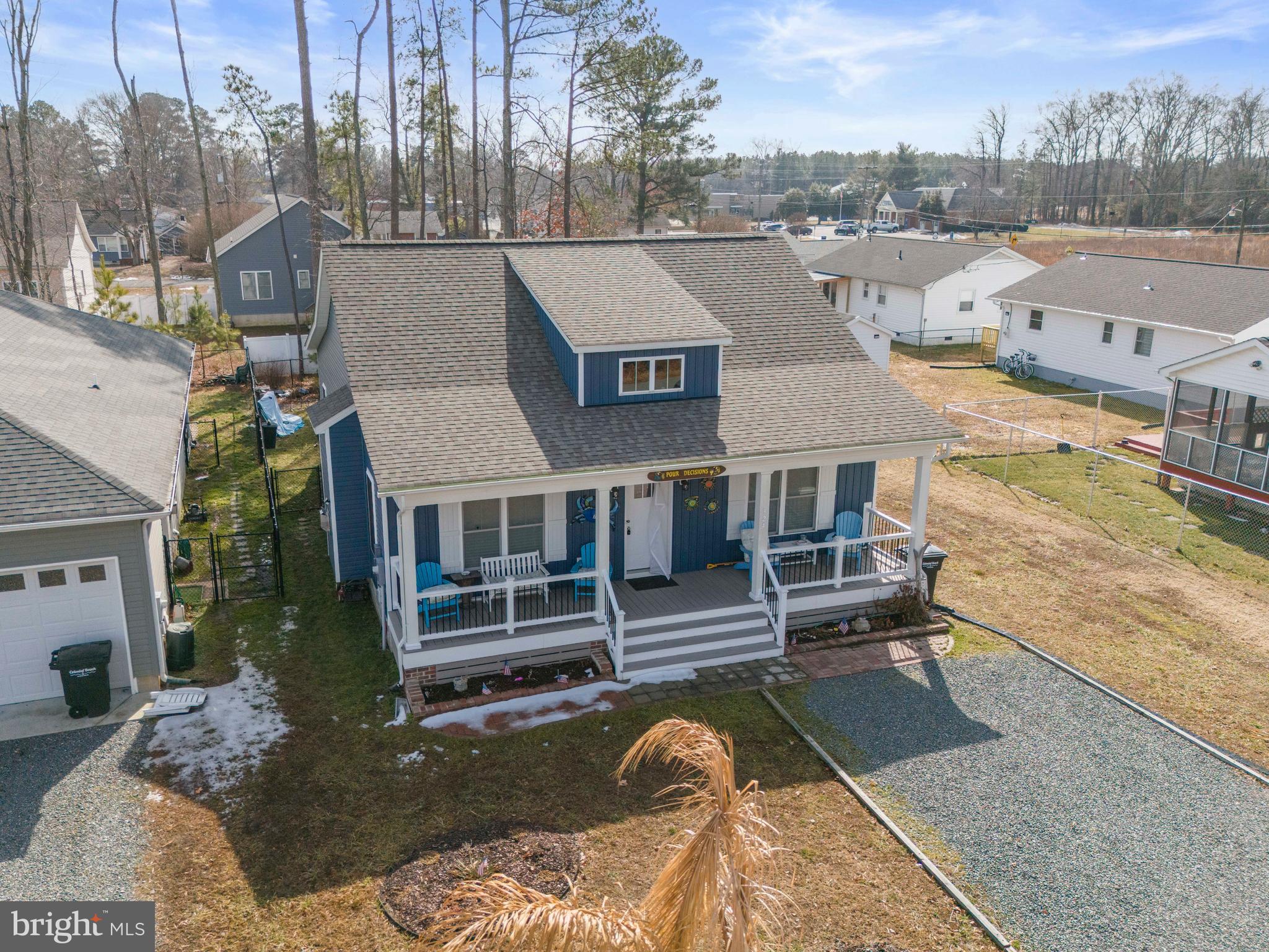 324 3rd Street Colonial Beach, VA 22443 - Photo 36 of 37 an aerial view of a house with a yard and balcony